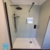 1100mm Black Frameless Wet Room Shower Screen - Corvus