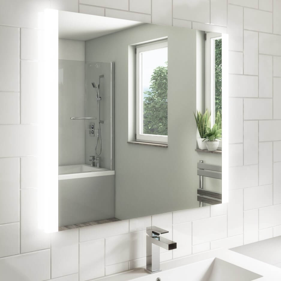 Modern bathroom mirror with LED backlight set above sink.